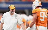 Brianna Paciorka/News Sentinel / USA TODAY NETWORK via Imagn Images | Tennessee head coach Josh Heupel high fives Tennessee defensive lineman Nathan Robinson (94) during the Aflac Kickoff Game between the Volunteers and Syracuse held at Mercedes-Benz Stadium in Atlanta, Ga., on August 30, 2025.