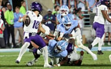 UNC defensive linemen Xavier Lewis and CJ Mims