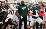 Michigan State tight end Jack Velling (12) makes a catch against Western Michigan defensive end Kershawn Fisher (20) during the first half at Spartan Stadium in East Lansing on Friday, August 29, 2025. - Junfu Han, USA TODAY Sports