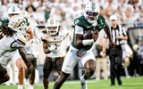 Michigan State's Aidan Chiles runs for a gain against Western Michigan during the second quarter on Friday, Aug. 29, 2025, in East Lansing. - Nick King, USA TODAY Sports