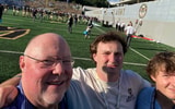 Army commit Malcolm Roberts with dad and younger brother A