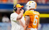 Brianna Paciorka/News Sentinel / USA TODAY NETWORK via Imagn Images | Tennessee head coach Josh Heupel talks to Tennessee quarterback Joey Aguilar (6) during the Aflac Kickoff Game between the Volunteers and Syracuse held at Mercedes-Benz Stadium in Atlanta, Ga., on August 30, 2025.