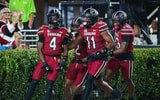 Vicari Swain celebrates a punt return touchdown (Photo by Katie Dugan)