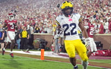 Michigan's Justice Haynes (22) scores in the second half of the college football game between the University of Oklahoma Sooner and the University of Michigan Wolverines at the Gaylord Family √ê Oklahoma Memorial Stadium in Norman, Okla., Saturday, Sept. 6, 2025. (Sarah Phipps/The Oklahoman)