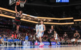 Mar 15, 2025; Charlotte, NC, USA; Louisville Cardinals guard J'Vonne Hadley (1) goes to the basket against Duke Blue Devils during the 2025 ACC Conference Championship game at Spectrum Center. Mandatory Credit: Jim Dedmon-Imagn Images