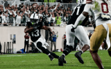 Sep 6, 2025; East Lansing, Michigan, USA; Michigan State wide receiver Chrishon McCray (13) runs the ball in the fourth quarter at Spartan Stadium. (Credit: Brendan Mullin-Imagn Images)
