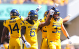West Virginia's defense forces the fourth down against Robert Morris