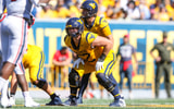 West Virginia offensive lineman Phillip Bowser before the snap