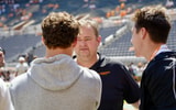 Josh Heupel greets Cooper Witten and JP Peace