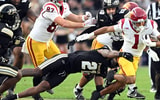 USC Trojans running back Eli Sanders (1) is tackled by Purdue Boilermakers defensive back Tahj Ra-El (21) during the second quarter at Ross-Ade Stadium