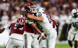 South Carolina Gamecocks quarterback LaNorris Sellers (16) is hit by Vanderbilt Commodores linebacker Langston Patterson (10) as he passes. Sellers was injured on the play and Patterson was ejected for targeting in the second quarter at Williams-Brice Stadium. Mandatory Credit: Jeff Blake-Imagn Images