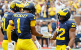 Sep 13, 2025; Ann Arbor, Michigan, USA; Michigan Wolverines running back Justice Haynes (22) receives congratulations from offensive lineman Greg Crippen (51) and wide receiver Donaven McCulley (1) after scoring in the first half against the Central Michigan Chippewas at Michigan Stadium. Mandatory Credit: Rick Osentoski-Imagn Images