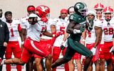 Michigan State's Nick Marsh, right, runs after a catch as Youngstown State's Carston Marshall follows behind during the second quarter on Saturday, Sept. 13, 2025, at Spartan Stadium in East Lansing. - Nick King, USA TODAY Sports