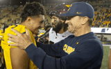 Cal quarterback Jaron-Keawe Sagpolutele and head coach Justin Wilcox