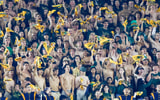 Notre Dame fans with rally towels