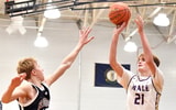 Male’s Trey Hillerich (21) shoots over the defense of Frederick Douglass' Tate Robinson (13) during the first half of their game in the King Of The Bluegrass Tournament, Thursday, Dec. 19 2024 in Louisville Ky.  © Timothy D. Easley/Special to the Courier-Journal / USA TODAY NETWORK via Imagn Images