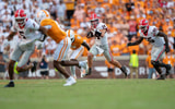 Gunner Stockton carries the ball against Tennessee.