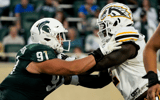 Michigan State Spartans defensive lineman Alex VanSumeren (91) engages with Western Michigan Broncos offensive lineman Raheem Anderson II (62) during the 2nd quarter at Spartan Stadium. - Brendan Mullin, USA TODAY Sports