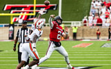 Texas Tech QB Behren Morton throwing a deep ball against Oregon St