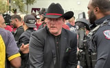 ESPN's Pat McAfee arrives on the set of College GameDay in Norman on Saturday.