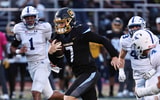 Moeller QB Matt Ponatoski (7) runs the ball during their football game against St. Xavier Friday, Sept. 19, 2025. (© Tony Tribble for The Enquirer / USA TODAY NETWORK via Imagn Images)