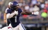 UConn Football RB Cam Edwards (1) runs away from a Ball State defender
