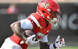 Sep 20, 2025; Louisville, Kentucky, USA; Louisville Cardinals wide receiver Caullin Lacy (5) returns a kickoff against the Bowling Green Falcons during the first quarter at L&N Federal Credit Union Stadium. Mandatory Credit: Jamie Rhodes-Imagn Images