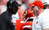 Louisville football head coach Jeff Brohm, right, talks with defense coordinator Ron English as the Cards take on Bowling Green in football Saturday, Sept. 20, 2025, in Louisville, Kentucky