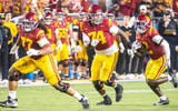 USC offensive linemen Alani Noa and Justin Tauanuu block for running back Waymond Jordan