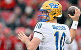 Nov 23, 2024; Louisville, Kentucky, USA; Pittsburgh Panthers quarterback Eli Holstein (10) throws against the Louisville Cardinals during the first quarter at L&N Federal Credit Union Stadium. Mandatory Credit: Jamie Rhodes-Imagn Images