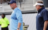 UNC coach Bill Belichick and offensive coordinator Freddie Kitchens in the pregame before the loss at UCF.
