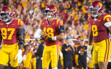 USC defenders Jide Abasiri, Eric Gentry and Devan Thompkins