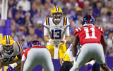 Oct 12, 2024; Baton Rouge, Louisiana, USA; LSU Tigers quarterback Garrett Nussmeier (13) calls for the ball against the Mississippi Rebels during the first half at Tiger Stadium. Mandatory Credit: Stephen Lew-Imagn Images