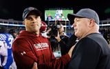 Oct 8, 2022; Lexington, Kentucky, USA; South Carolina Gamecocks head coach Shane Beamer and Kentucky Wildcats head coach Mark Stoops shake hands after a game at Kroger Field. Mandatory Credit: Jordan Prather-Imagn Images