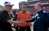 Illinois Fighting Illini head coach Bret Bielema, and USC Trojans head coach Lincoln Riley shake hands after the 34-32 Illini win at Memorial Stadium