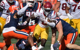 USC Trojans running back Waymond Jordan (2) runs through the Illinois Fighting Illini defensive line during the second half at Memorial Stadium