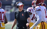 USC Trojans head coach Lincoln Riley talks with players during the first half against the Illinois Fighting Illini at Memorial Stadium