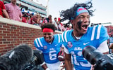 Ole Miss QBs Trinidad Chambliss (6) and Austin Simmons (13)