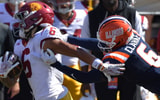 Illinois Fighting Illini defensive back Jaheim Clarke (6) pursues USC Trojans wide receiver Makai Lemon (6) during the second half at Memorial Stadium