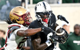 Michigan State's Nick Marsh, right, catches a touchdown pass as Boston College's Amari Jackson attempts to make the tackle during the first quarter on Saturday, Sept. 6, 2025, at Spartan Stadium. - Nick King, USA TODAY Sports
