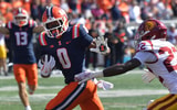 Illinois Fighting Illini wide receiver Justin Bowick (0) runs past USC Trojans cornerback Braylon Conley (22) and scores on a 25 yard reception for a touchdown during the second half at Memorial Stadium