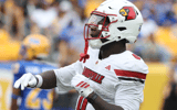 Sep 27, 2025; Pittsburgh, Pennsylvania, USA; Louisville Cardinals wide receiver Chris Bell (0) celebrates his touchdown against the Pittsburgh Panthers during the second quarter at Acrisure Stadium. Mandatory Credit: Charles LeClaire-Imagn Images