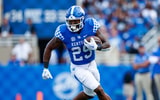Sep 17, 2022; Lexington, Kentucky, USA; Kentucky Wildcats running back La'Vell Wright (29) runs the ball during the fourth quarter against the Youngstown State Penguins at Kroger Field. Mandatory Credit: Jordan Prather-Imagn Images
