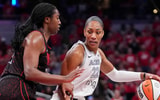 Indiana Fever forward Aliyah Boston (7) defends Las Vegas Aces center A'ja Wilson (22) during Game 4 of the WNBA semifinals on Sunday, Sept. 28, 2025, at Gainbridge Fieldhouse in Indianapolis.
