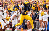 Michigan wide receiver Andrew Marsh (4) runs into the end zone for a touchdown against Central Michigan defensive back Brenden Deasfernandes (3) and linebacker Jordan Kwiatkowski (12)*during the first half at Michigan Stadium in Ann Arbor on Saturday, Sept. 13, 2025. © Junfu Han / USA TODAY NETWORK via Imagn Images