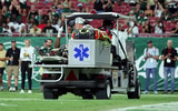 USF RB Cartevious Norton carted off with an injury vs. Charlotte