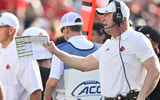 Oct 4, 2025; Louisville, Kentucky, USA; Louisville Cardinals head coach Jeff Brohm calls out instructions during the second quarter against the Virginia Cavaliers at L&N Federal Credit Union Stadium. Virginia defeated Louisville 30-27. Mandatory Credit: Jamie Rhodes-Imagn Images