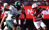 Michigan State Spartans defensive back Dontavius Nash (28) attempts to tackle Nebraska Cornhuskers wide receiver Jacory Barney Jr. (2) at Memorial Stadium. - Kylie Graham, USA TODAY Sports