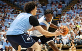 Caleb Wilson faces up Zayden High during UNC basketball's Blue-White scrimmage.