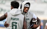Michigan State's quarterback Aidan Chiles, right, hugs Nick Marsh before the football game against Western Michigan on Friday, Aug. 29, 2025, in East Lansing. - Nick King, USA TODAY Sports